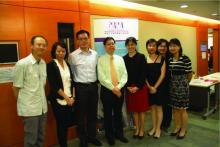 A group photo of two speakers with PRPA committee members.