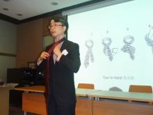 Mr Peter CHOW, Image Consultant of Fanny Lee Image Consultancy, shows the audiences how to tie a Four-In-Hand necktie.